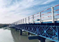 Geprefabriceerde het Staalbrug van Vestingmuur voor Brug van het het Project de Draagbare Structurele Staal van de Watermilieubescherming met het Steunen van Pijlers leverancier
